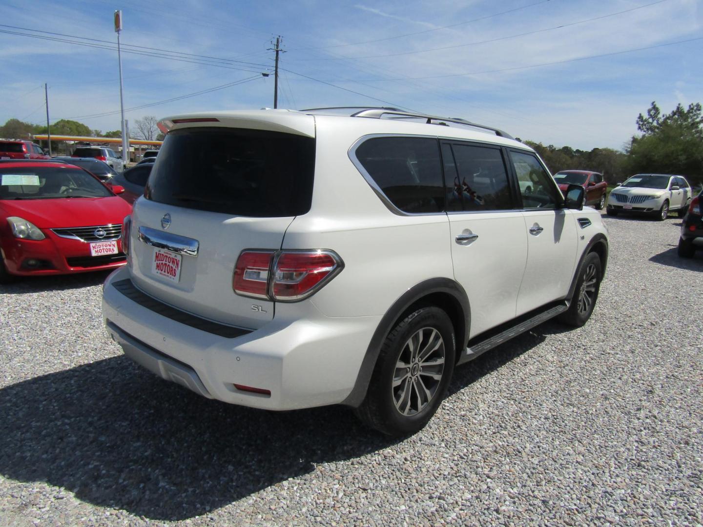 2018 White Nissan Armada Platinum 2WD (JN8AY2ND5J9) with an 5.6L V8 DOHC 32V engine, Automatic transmission, located at 15016 S Hwy 231, Midland City, AL, 36350, (334) 983-3001, 31.306210, -85.495277 - Photo#7