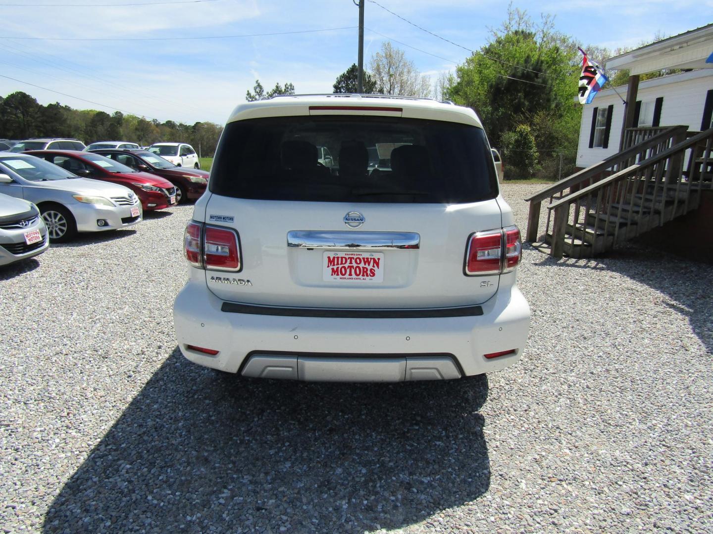 2018 White Nissan Armada Platinum 2WD (JN8AY2ND5J9) with an 5.6L V8 DOHC 32V engine, Automatic transmission, located at 15016 S Hwy 231, Midland City, AL, 36350, (334) 983-3001, 31.306210, -85.495277 - Photo#6