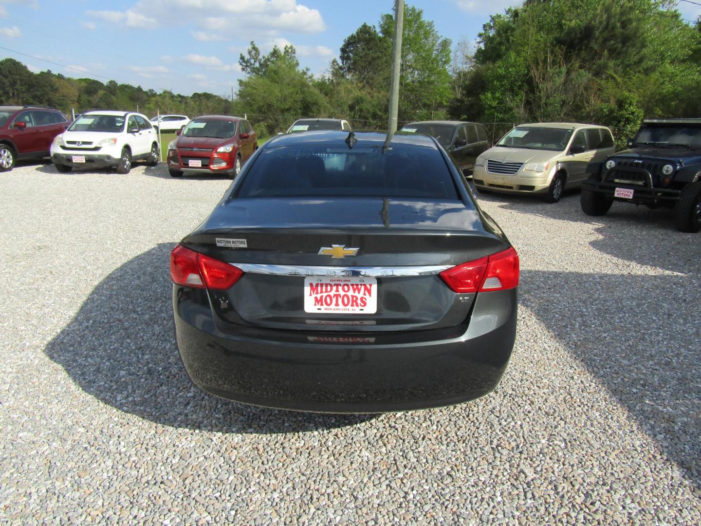 2015 Gray Chevrolet Impala LS (1G11Z5SL6FU) with an 2.5L L4 DOHC 16V engine, Automatic transmission, located at 15016 S Hwy 231, Midland City, AL, 36350, (334) 983-3001, 31.306210, -85.495277 - Photo#6