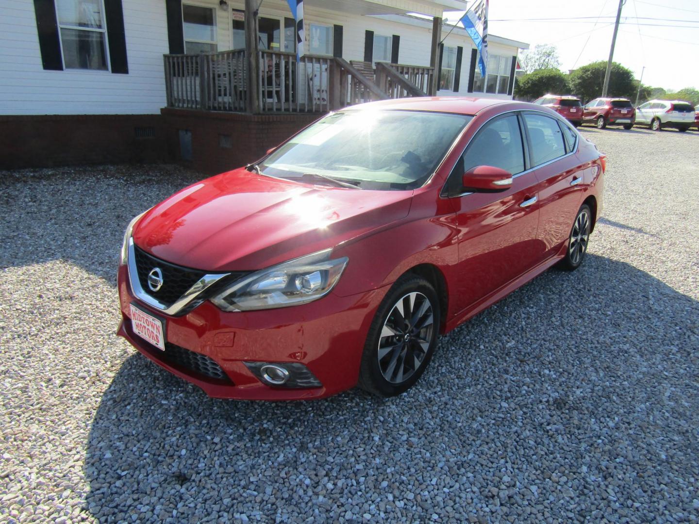2017 Red Nissan Sentra S 6MT (3N1AB7AP3HY) with an 1.8L L4 SFI DOHC 16V engine, Automatic transmission, located at 15016 S Hwy 231, Midland City, AL, 36350, (334) 983-3001, 31.306210, -85.495277 - Photo#2