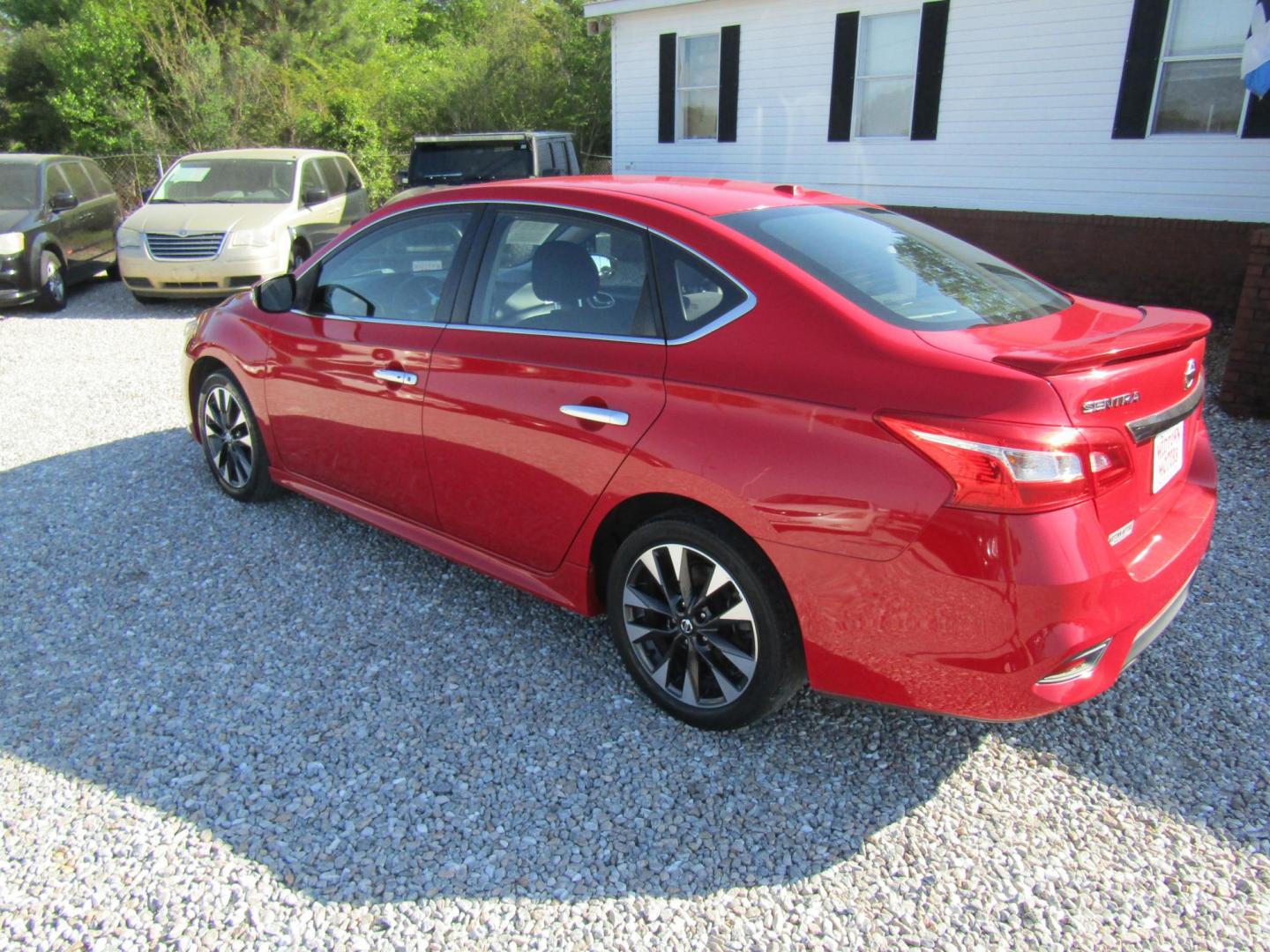 2017 Red Nissan Sentra S 6MT (3N1AB7AP3HY) with an 1.8L L4 SFI DOHC 16V engine, Automatic transmission, located at 15016 S Hwy 231, Midland City, AL, 36350, (334) 983-3001, 31.306210, -85.495277 - Photo#4