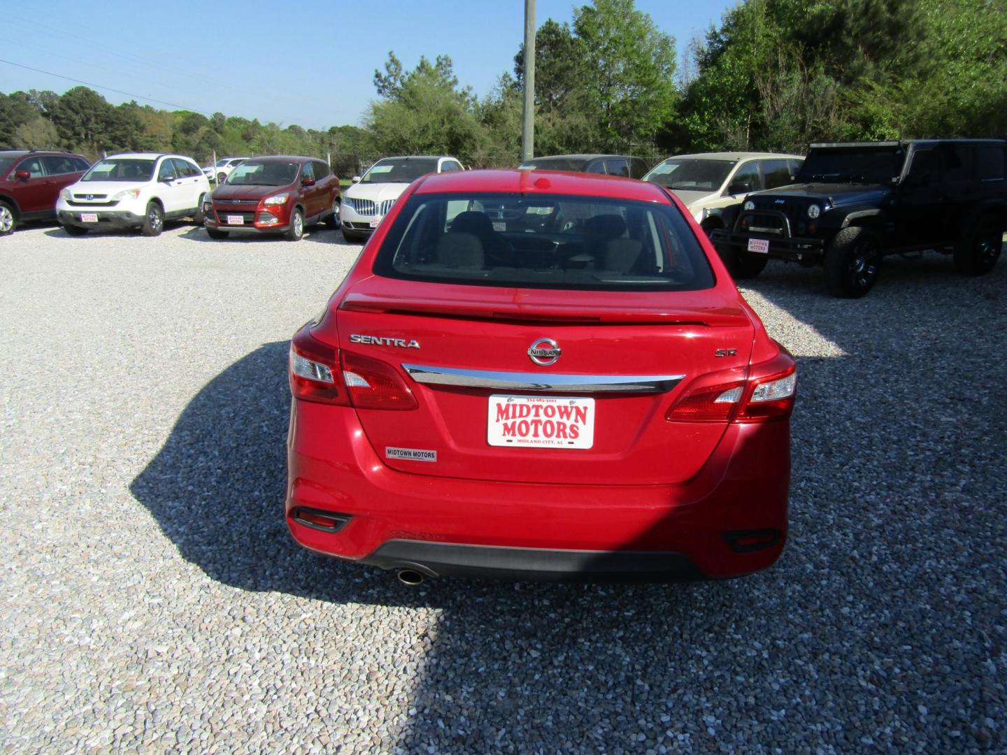 2017 Red Nissan Sentra S 6MT (3N1AB7AP3HY) with an 1.8L L4 SFI DOHC 16V engine, Automatic transmission, located at 15016 S Hwy 231, Midland City, AL, 36350, (334) 983-3001, 31.306210, -85.495277 - Photo#5