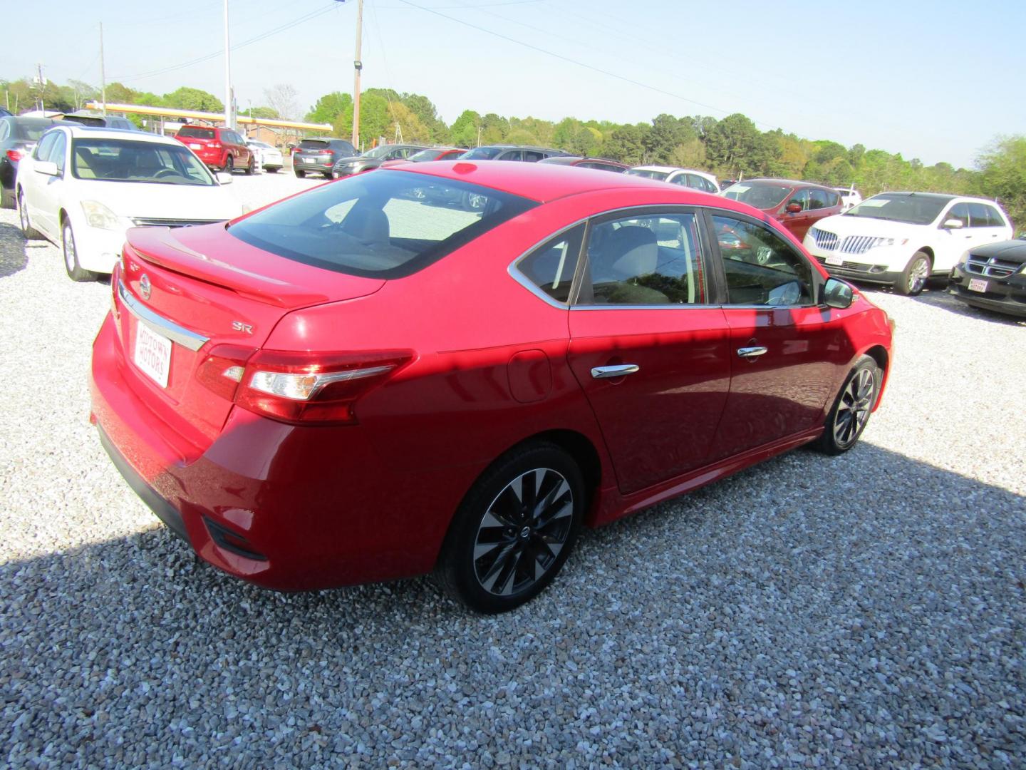 2017 Red Nissan Sentra S 6MT (3N1AB7AP3HY) with an 1.8L L4 SFI DOHC 16V engine, Automatic transmission, located at 15016 S Hwy 231, Midland City, AL, 36350, (334) 983-3001, 31.306210, -85.495277 - Photo#6