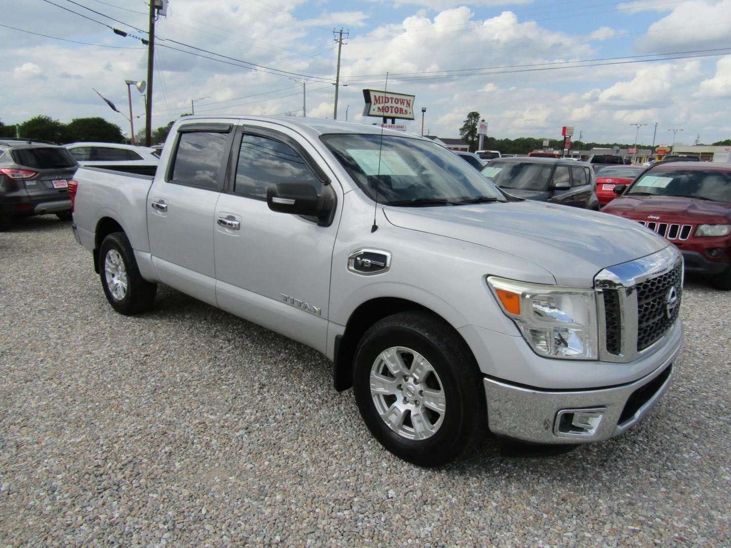 2017 Silver Nissan Titan S Crew Cab 2WD (1N6AA1EK7HN) with an 5.6L V8 DOHC 32V engine, Automatic transmission, located at 15016 S Hwy 231, Midland City, AL, 36350, (334) 983-3001, 31.306210, -85.495277 - Photo#0