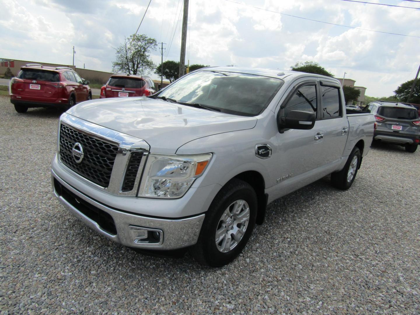 2017 Silver Nissan Titan S Crew Cab 2WD (1N6AA1EK7HN) with an 5.6L V8 DOHC 32V engine, Automatic transmission, located at 15016 S Hwy 231, Midland City, AL, 36350, (334) 983-3001, 31.306210, -85.495277 - Photo#1