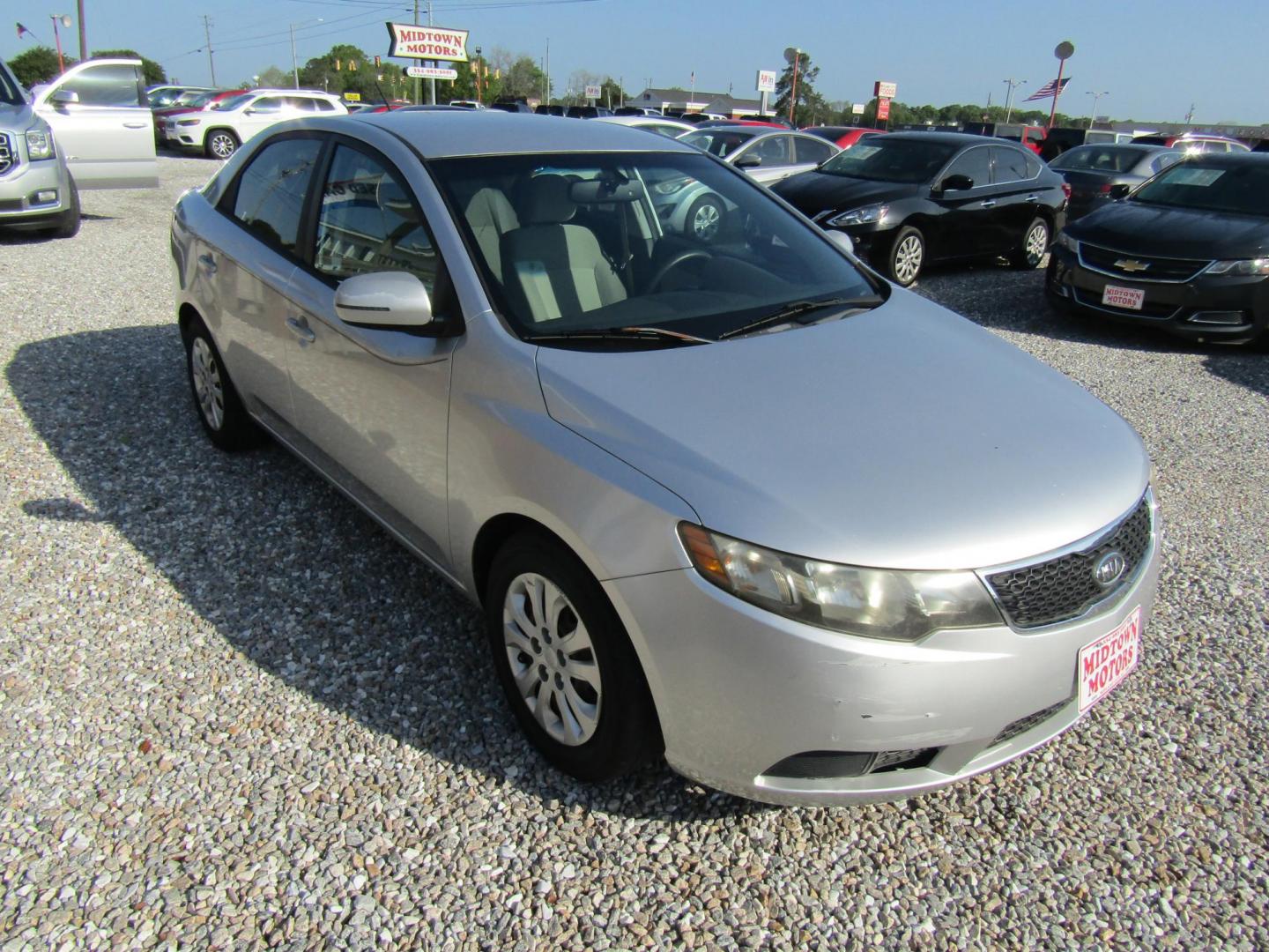 2012 Silver Kia Forte EX (KNAFU4A24C5) with an 2.0L L4 DOHC 16V engine, Automatic transmission, located at 15016 S Hwy 231, Midland City, AL, 36350, (334) 983-3001, 31.306210, -85.495277 - Photo#0