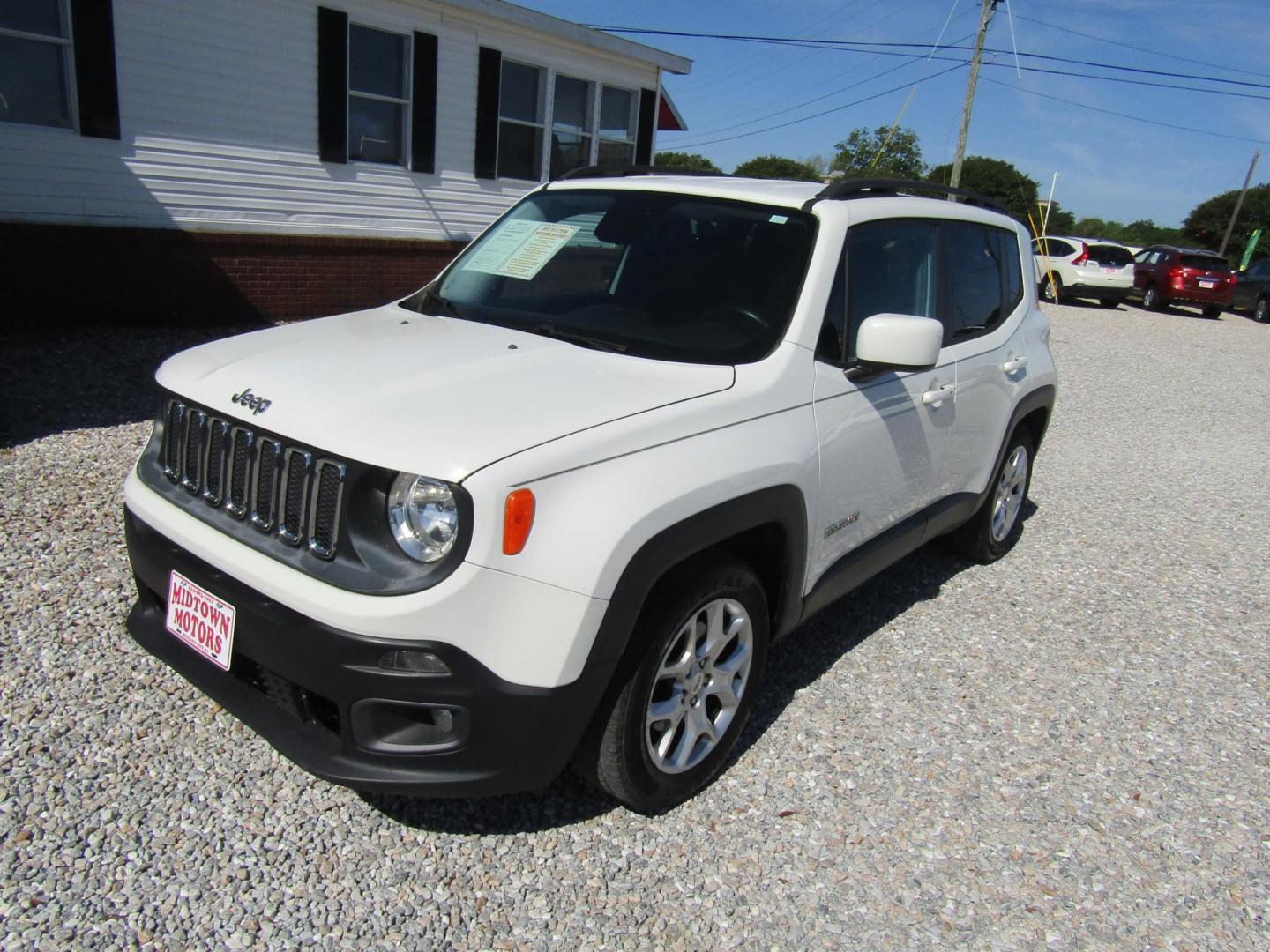 2016 White Jeep Renegade Latitude FWD (ZACCJABT7GP) with an 2.4L L4 DOHC 16V engine, Automatic transmission, located at 15016 S Hwy 231, Midland City, AL, 36350, (334) 983-3001, 31.306210, -85.495277 - Photo#1