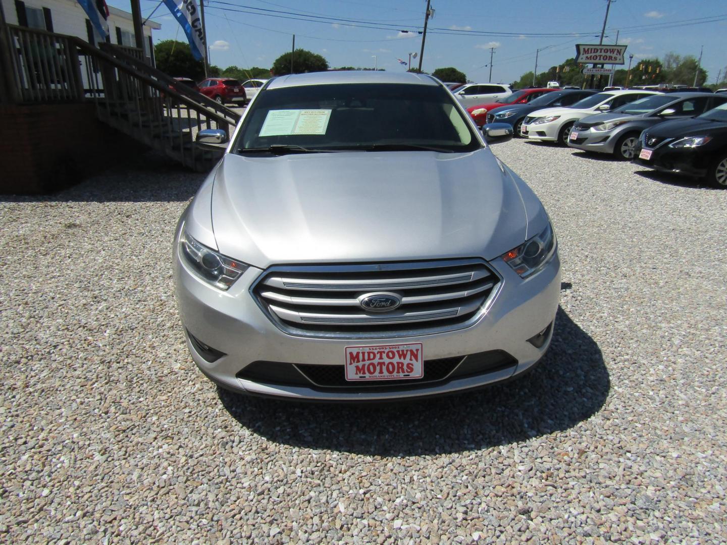 2018 Silver Ford Taurus Limited FWD (1FAHP2F81JG) with an 3.5L V6 DOHC 24V engine, Automatic transmission, located at 15016 S Hwy 231, Midland City, AL, 36350, (334) 983-3001, 31.306210, -85.495277 - Photo#0
