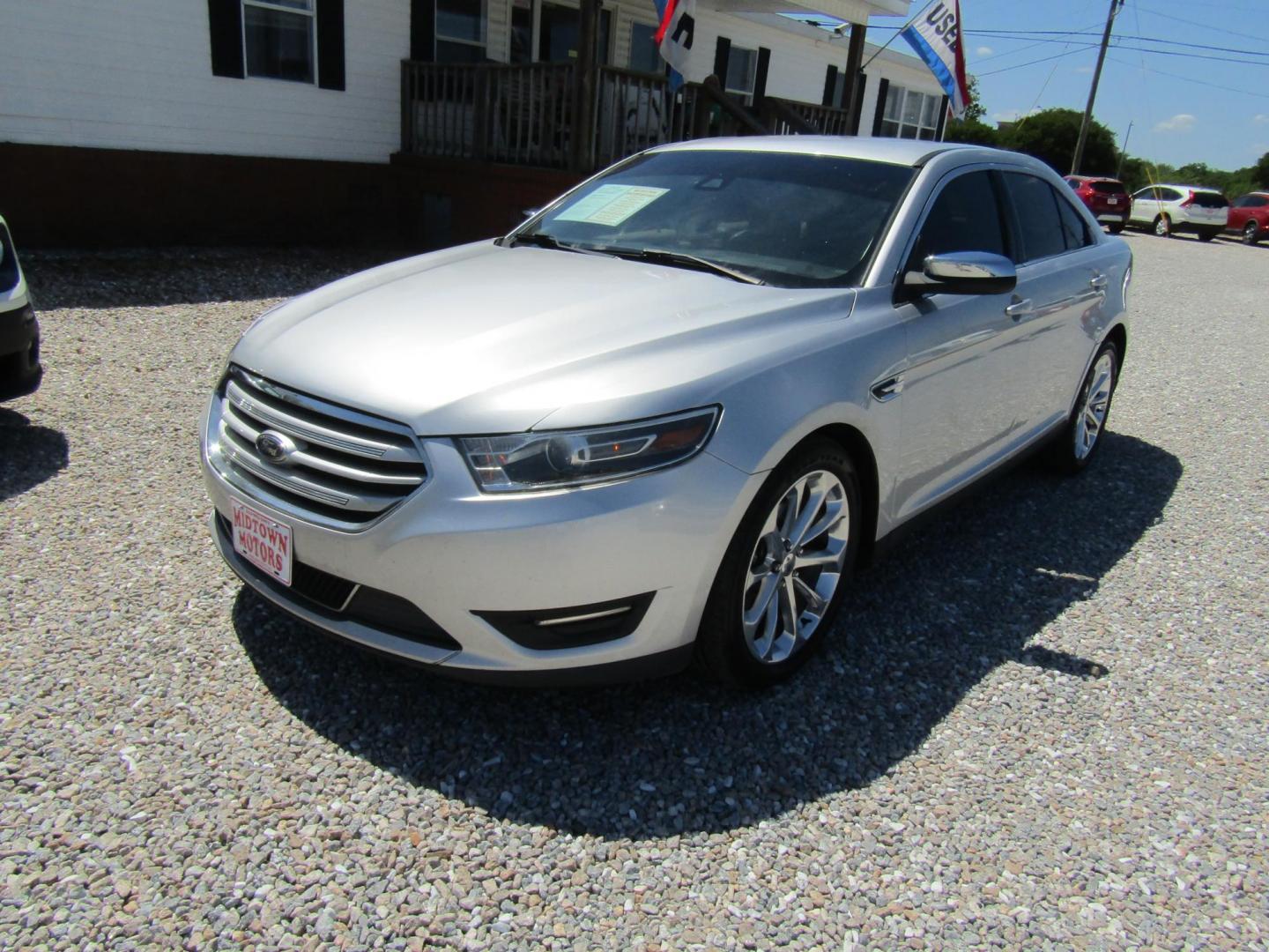 2018 Silver Ford Taurus Limited FWD (1FAHP2F81JG) with an 3.5L V6 DOHC 24V engine, Automatic transmission, located at 15016 S Hwy 231, Midland City, AL, 36350, (334) 983-3001, 31.306210, -85.495277 - Photo#1
