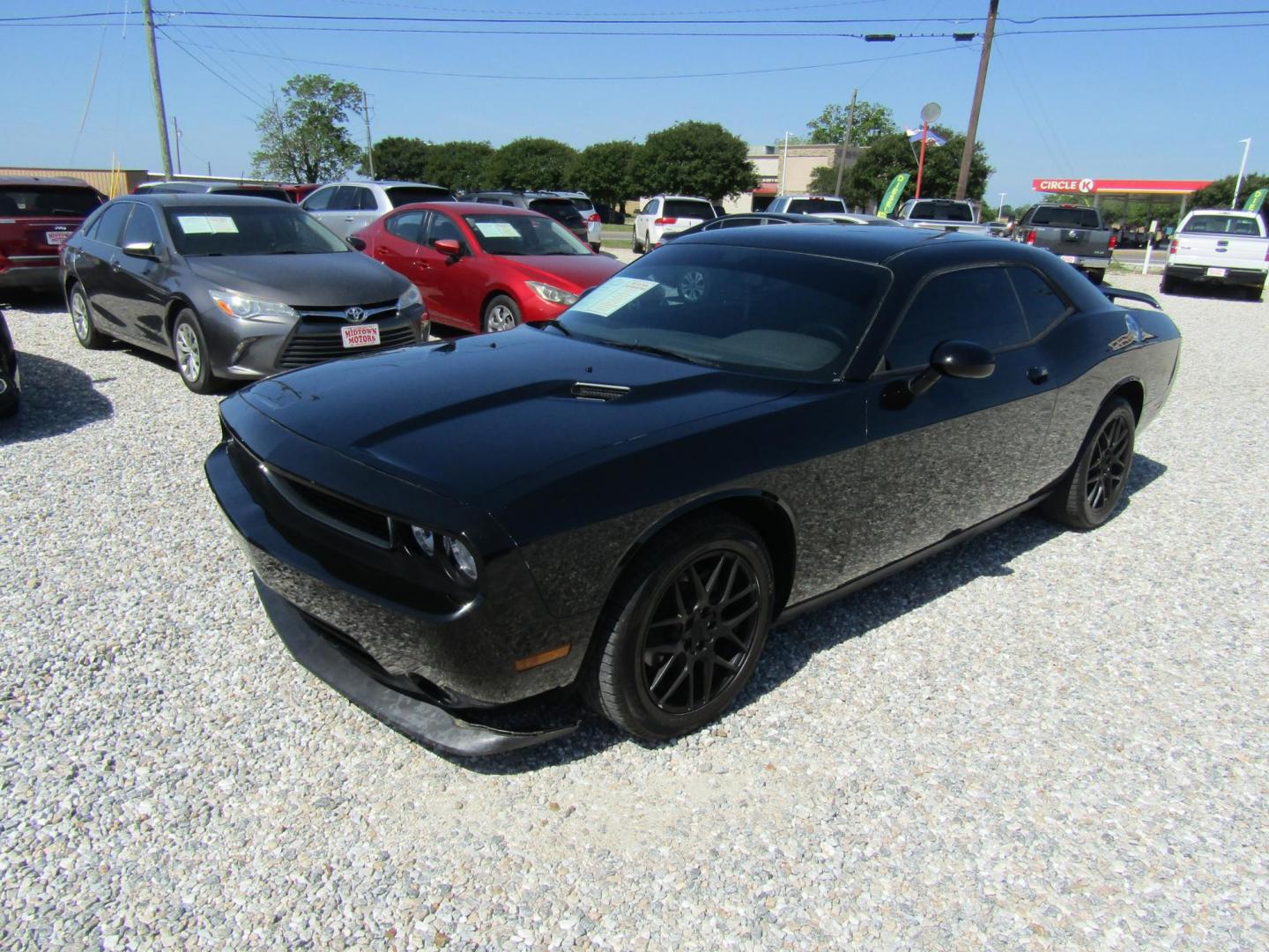 2013 Black Dodge Challenger SXT (2C3CDYAG4DH) with an 3.6L V6 DOHC 24V engine, Automatic transmission, located at 15016 S Hwy 231, Midland City, AL, 36350, (334) 983-3001, 31.306210, -85.495277 - Photo#2