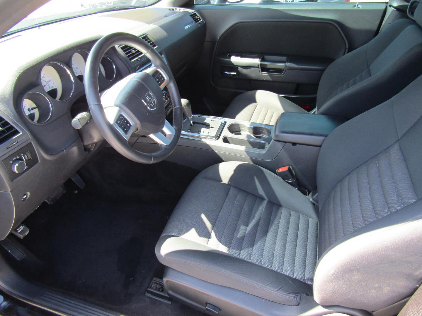 2013 Black Dodge Challenger SXT (2C3CDYAG4DH) with an 3.6L V6 DOHC 24V engine, Automatic transmission, located at 15016 S Hwy 231, Midland City, AL, 36350, (334) 983-3001, 31.306210, -85.495277 - Photo#3