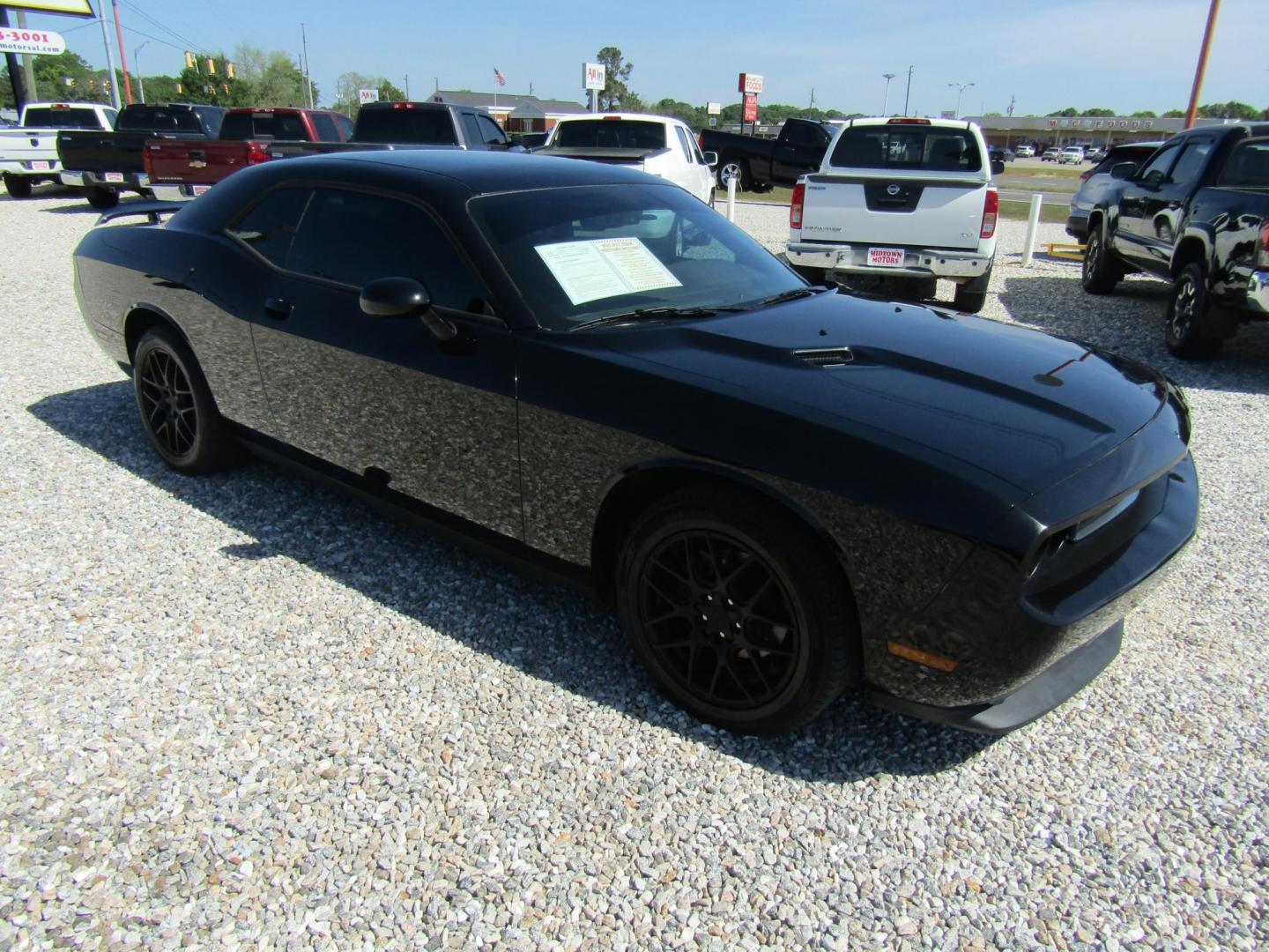 2013 Black Dodge Challenger SXT (2C3CDYAG4DH) with an 3.6L V6 DOHC 24V engine, Automatic transmission, located at 15016 S Hwy 231, Midland City, AL, 36350, (334) 983-3001, 31.306210, -85.495277 - Photo#0