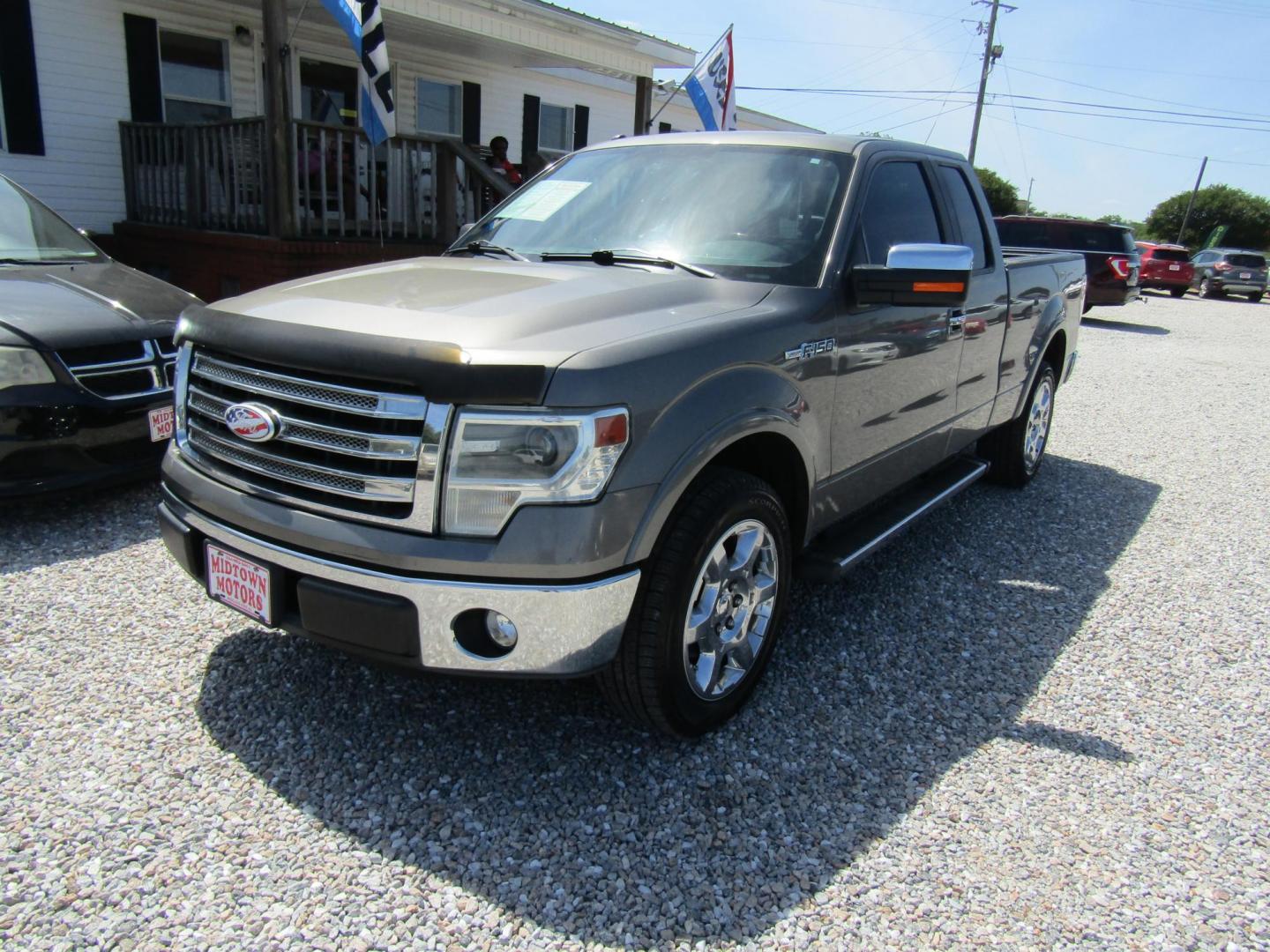 2013 Gray Ford F-150 Lariat SuperCab 6.5-ft. Bed 2WD (1FTFX1CF4DF) with an 5.0L V8 engine, Automatic transmission, located at 15016 S Hwy 231, Midland City, AL, 36350, (334) 983-3001, 31.306210, -85.495277 - Photo#2