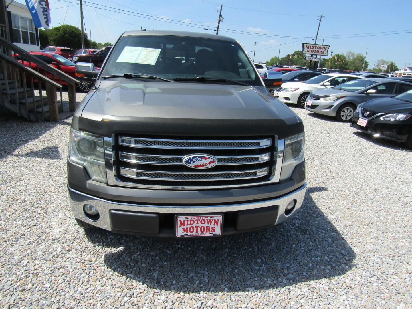 2013 Gray Ford F-150 Lariat SuperCab 6.5-ft. Bed 2WD (1FTFX1CF4DF) with an 5.0L V8 engine, Automatic transmission, located at 15016 S Hwy 231, Midland City, AL, 36350, (334) 983-3001, 31.306210, -85.495277 - Photo#1