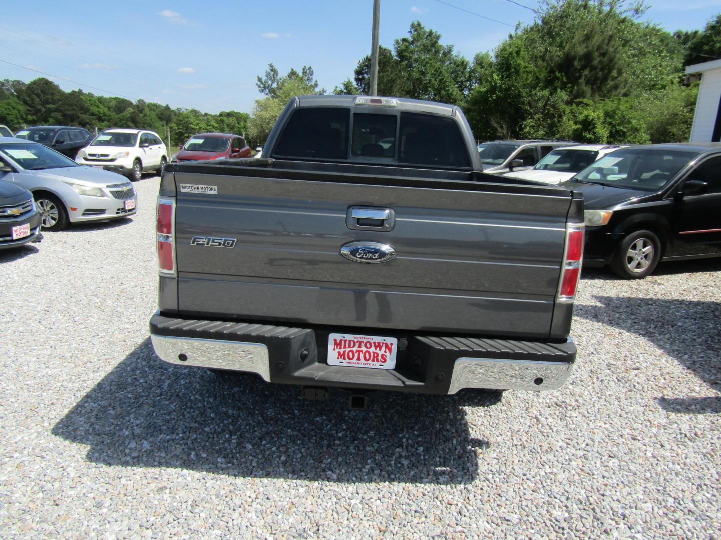 2013 Gray Ford F-150 Lariat SuperCab 6.5-ft. Bed 2WD (1FTFX1CF4DF) with an 5.0L V8 engine, Automatic transmission, located at 15016 S Hwy 231, Midland City, AL, 36350, (334) 983-3001, 31.306210, -85.495277 - Photo#5
