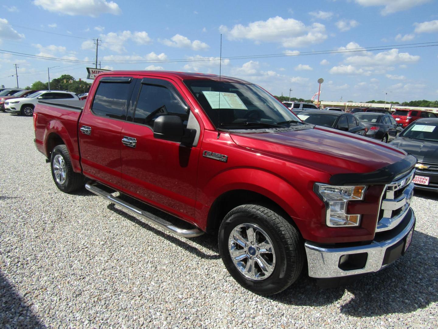 2015 Red Ford F-150 King-Ranch SuperCrew 5.5-ft. Bed 2WD (1FTEW1CF9FF) with an 5.0L V8 engine, Automatic transmission, located at 15016 S Hwy 231, Midland City, AL, 36350, (334) 983-3001, 31.306210, -85.495277 - Photo#0