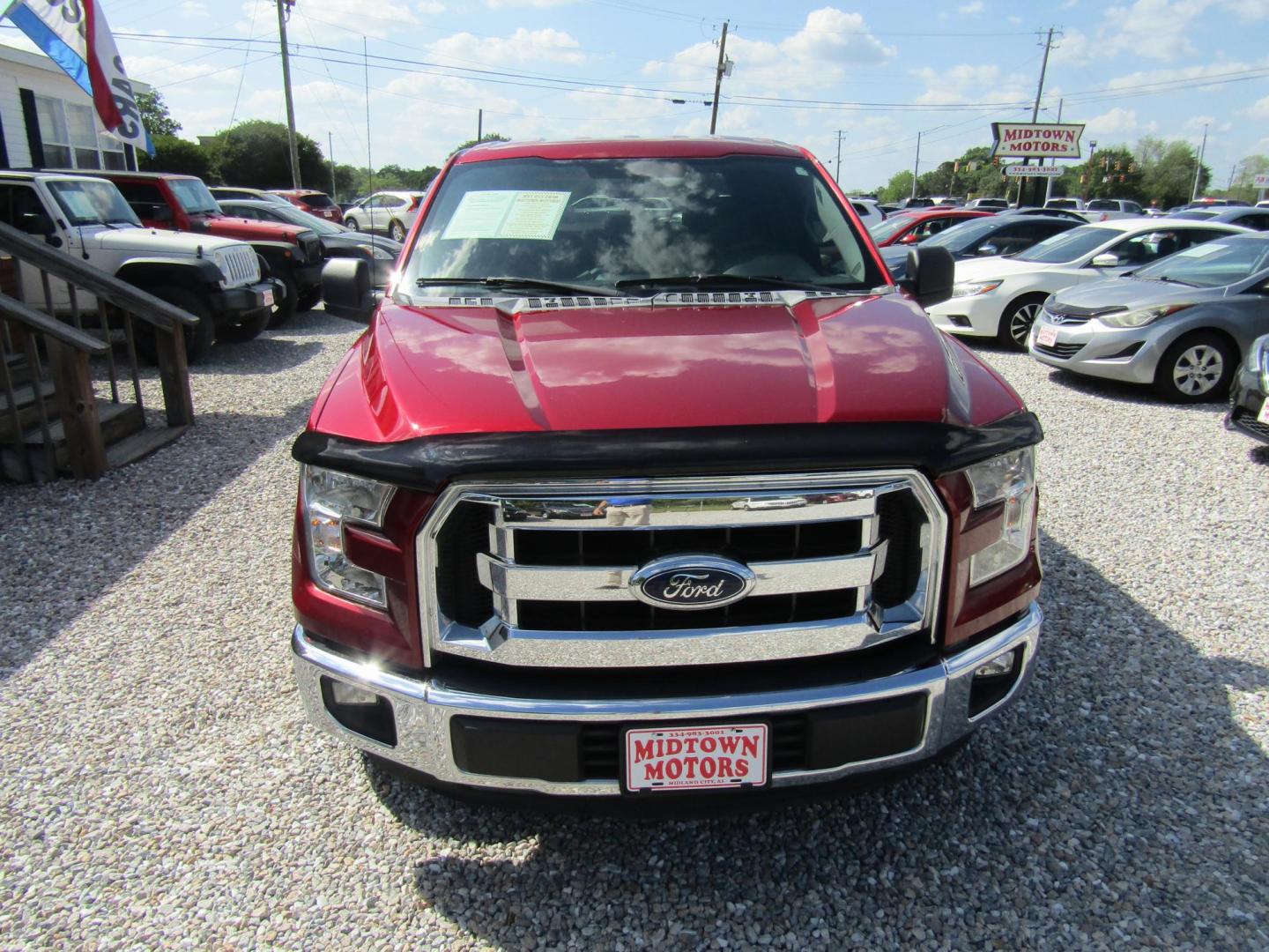 2015 Red Ford F-150 King-Ranch SuperCrew 5.5-ft. Bed 2WD (1FTEW1CF9FF) with an 5.0L V8 engine, Automatic transmission, located at 15016 S Hwy 231, Midland City, AL, 36350, (334) 983-3001, 31.306210, -85.495277 - Photo#1