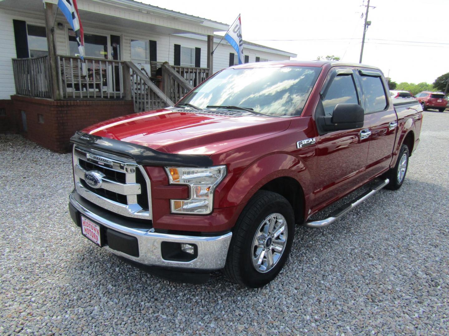 2015 Red Ford F-150 King-Ranch SuperCrew 5.5-ft. Bed 2WD (1FTEW1CF9FF) with an 5.0L V8 engine, Automatic transmission, located at 15016 S Hwy 231, Midland City, AL, 36350, (334) 983-3001, 31.306210, -85.495277 - Photo#2