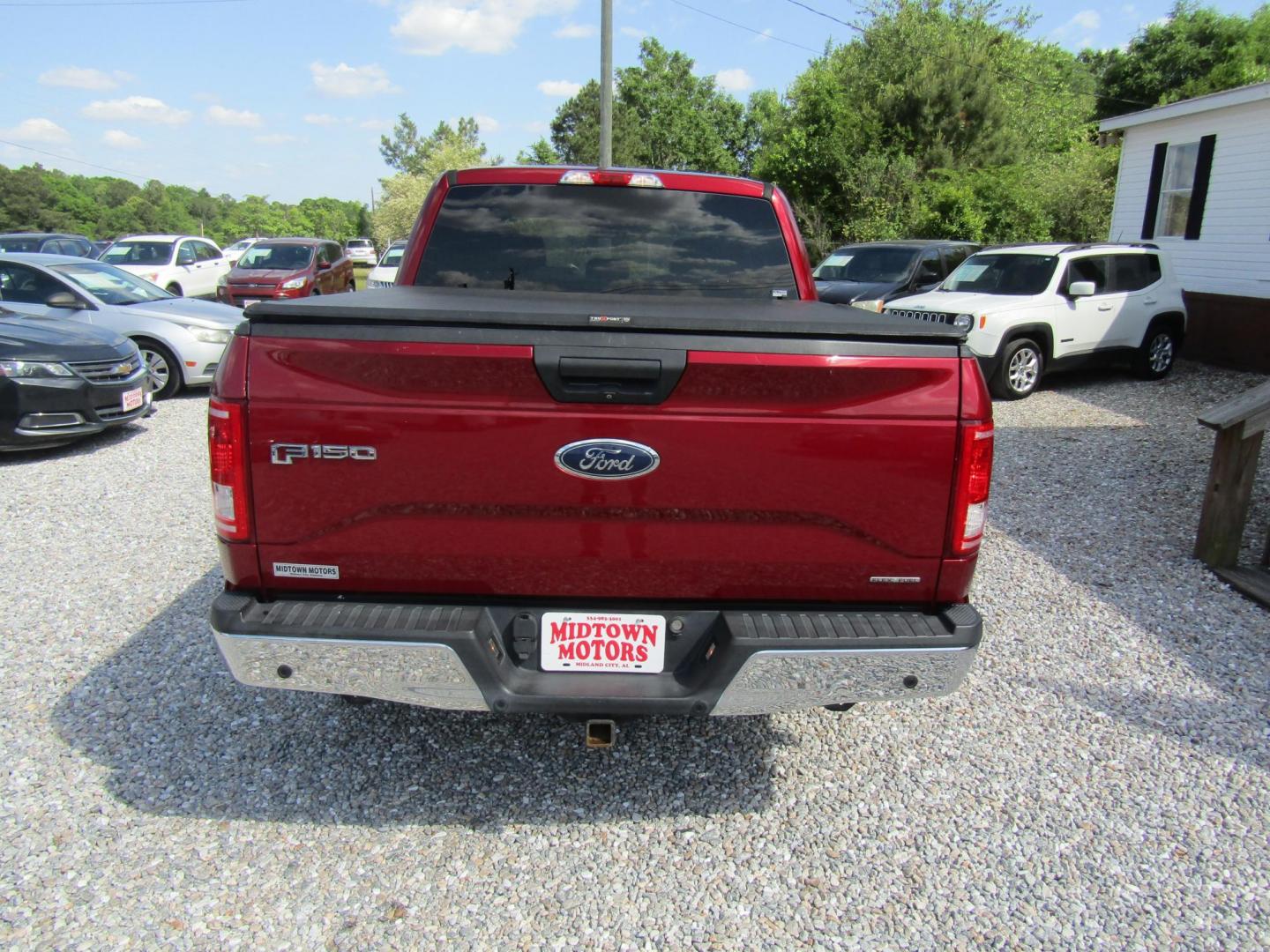 2015 Red Ford F-150 King-Ranch SuperCrew 5.5-ft. Bed 2WD (1FTEW1CF9FF) with an 5.0L V8 engine, Automatic transmission, located at 15016 S Hwy 231, Midland City, AL, 36350, (334) 983-3001, 31.306210, -85.495277 - Photo#5
