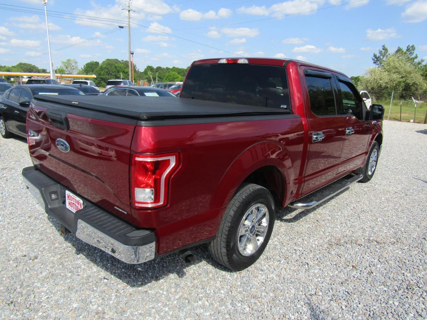 2015 Red Ford F-150 King-Ranch SuperCrew 5.5-ft. Bed 2WD (1FTEW1CF9FF) with an 5.0L V8 engine, Automatic transmission, located at 15016 S Hwy 231, Midland City, AL, 36350, (334) 983-3001, 31.306210, -85.495277 - Photo#6