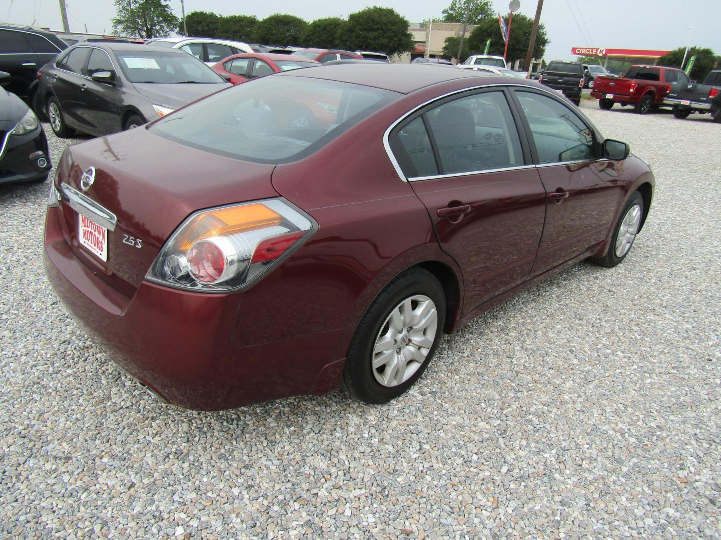 2011 Red Nissan Altima 2.5 S (1N4AL2APXBC) with an 2.5L L4 DOHC 16V engine, Automatic transmission, located at 15016 S Hwy 231, Midland City, AL, 36350, (334) 983-3001, 31.306210, -85.495277 - Photo#7
