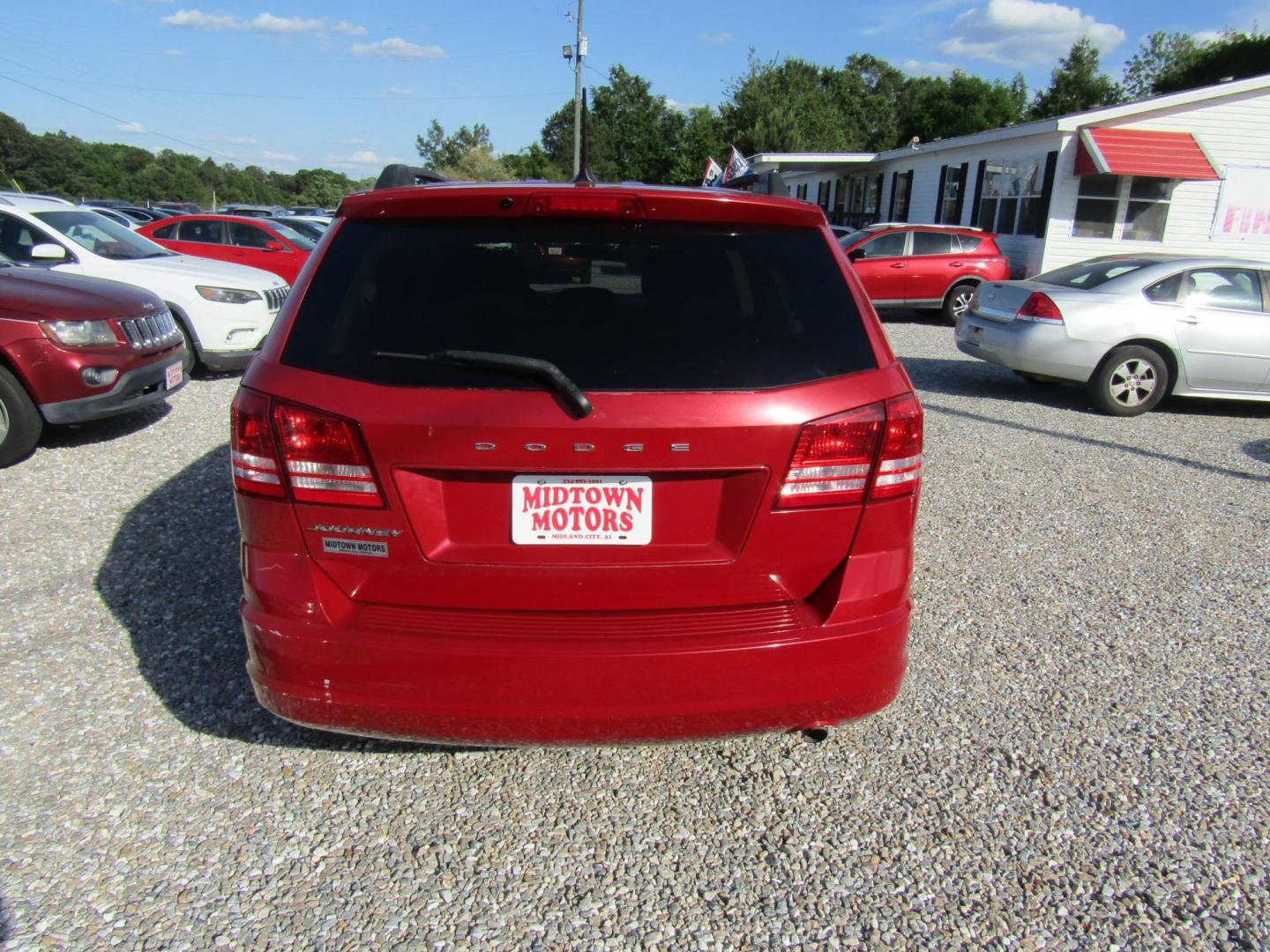2017 Red Dodge Journey SE (3C4PDCAB5HT) with an 2.4L L4 DOHC 16V engine, Automatic transmission, located at 15016 S Hwy 231, Midland City, AL, 36350, (334) 983-3001, 31.306210, -85.495277 - Photo#6