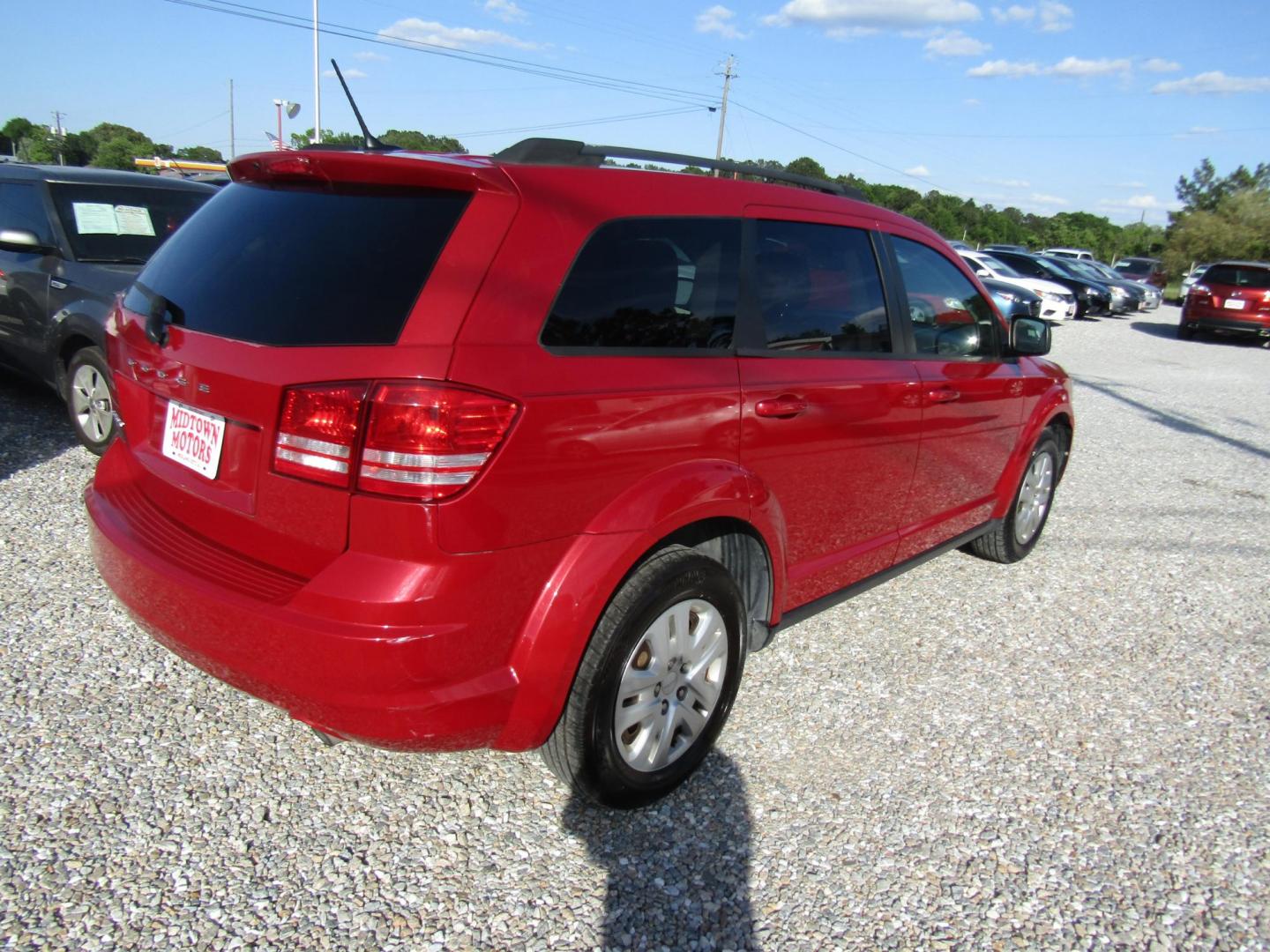 2017 Red Dodge Journey SE (3C4PDCAB5HT) with an 2.4L L4 DOHC 16V engine, Automatic transmission, located at 15016 S Hwy 231, Midland City, AL, 36350, (334) 983-3001, 31.306210, -85.495277 - Photo#7