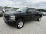 2010 Black Chevrolet Silverado 1500 LT1 Extended Cab 4WD (1GCSKSE35AZ) with an 5.3L V8 OHV 16V FFV engine, Automatic transmission, located at 15016 S Hwy 231, Midland City, AL, 36350, (334) 983-3001, 31.306210, -85.495277 - Photo#2