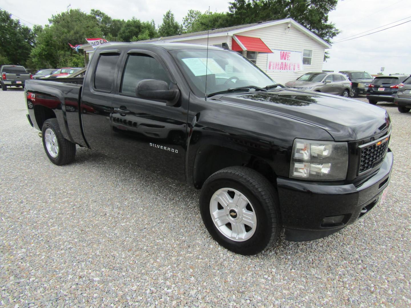 2010 Black Chevrolet Silverado 1500 LT1 Extended Cab 4WD (1GCSKSE35AZ) with an 5.3L V8 OHV 16V FFV engine, Automatic transmission, located at 15016 S Hwy 231, Midland City, AL, 36350, (334) 983-3001, 31.306210, -85.495277 - Photo#0