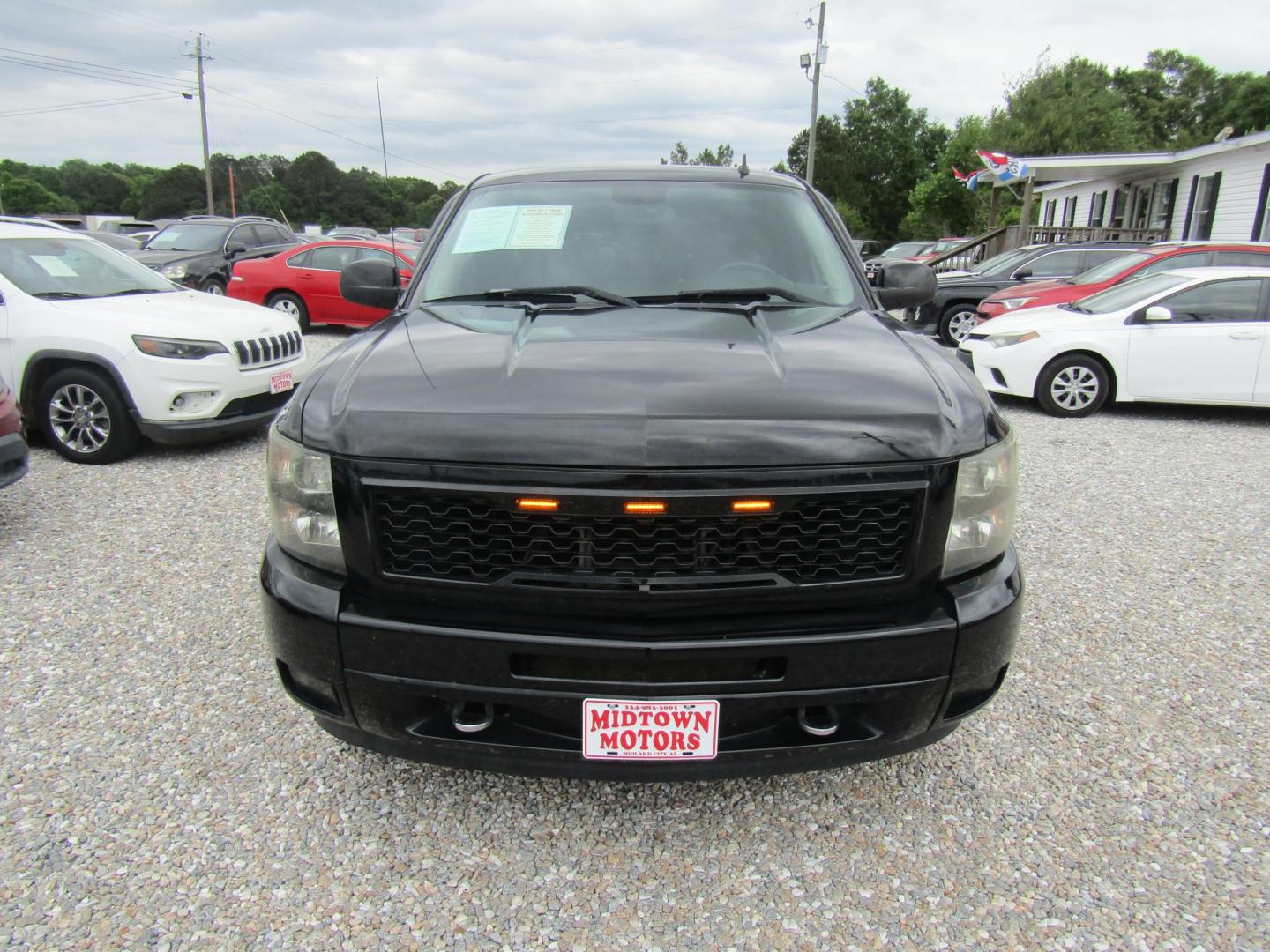 2010 Black Chevrolet Silverado 1500 LT1 Extended Cab 4WD (1GCSKSE35AZ) with an 5.3L V8 OHV 16V FFV engine, Automatic transmission, located at 15016 S Hwy 231, Midland City, AL, 36350, (334) 983-3001, 31.306210, -85.495277 - Photo#1