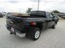 2010 Black Chevrolet Silverado 1500 LT1 Extended Cab 4WD (1GCSKSE35AZ) with an 5.3L V8 OHV 16V FFV engine, Automatic transmission, located at 15016 S Hwy 231, Midland City, AL, 36350, (334) 983-3001, 31.306210, -85.495277 - Photo#7