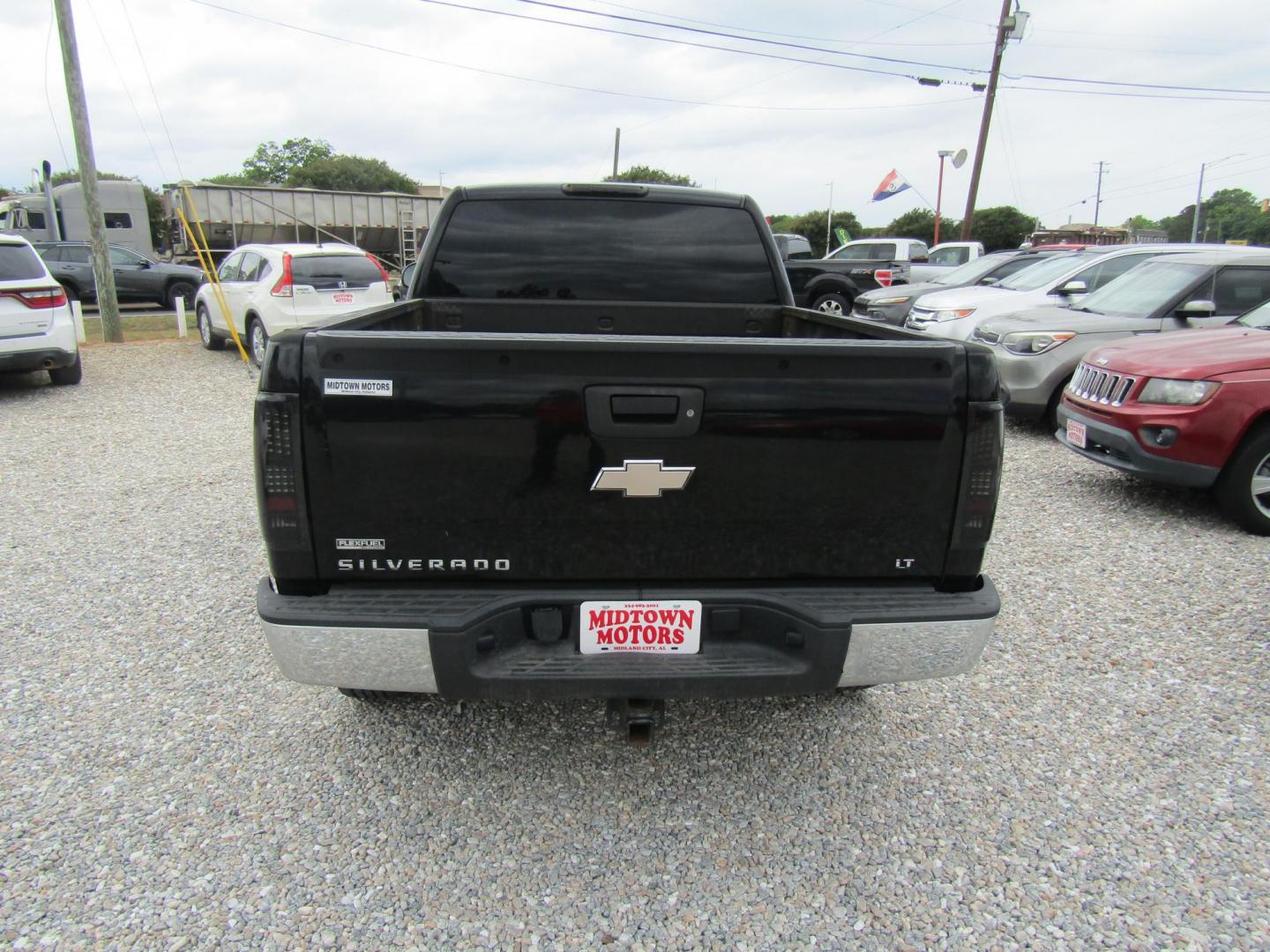 2010 Black Chevrolet Silverado 1500 LT1 Extended Cab 4WD (1GCSKSE35AZ) with an 5.3L V8 OHV 16V FFV engine, Automatic transmission, located at 15016 S Hwy 231, Midland City, AL, 36350, (334) 983-3001, 31.306210, -85.495277 - Photo#6