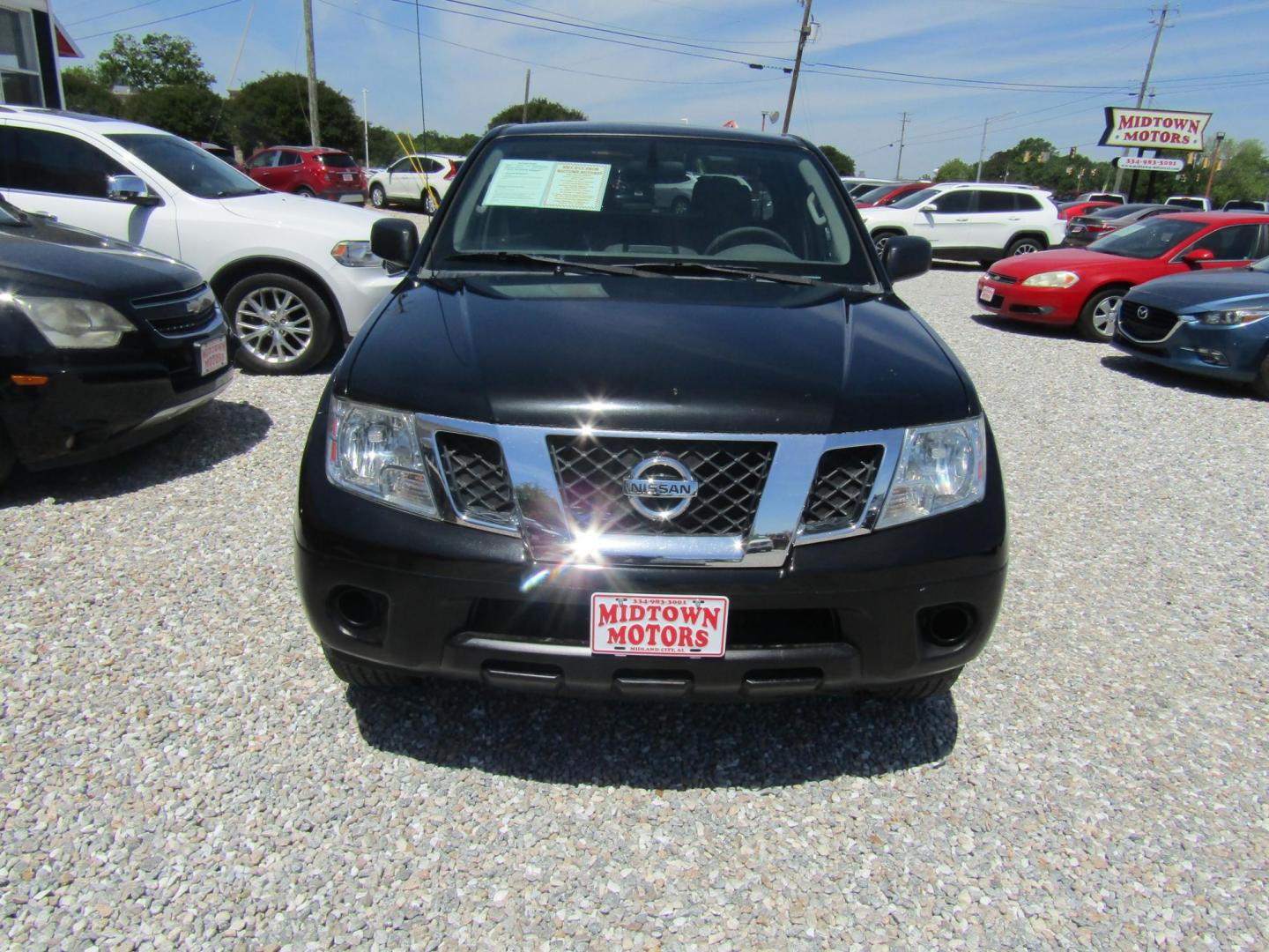 2016 Black Nissan Frontier SV King Cab I4 5MT 2WD (1N6BD0CT7GN) with an 2.5L L4 DOHC 16V engine, Automatic transmission, located at 15016 S Hwy 231, Midland City, AL, 36350, (334) 983-3001, 31.306210, -85.495277 - Photo#1