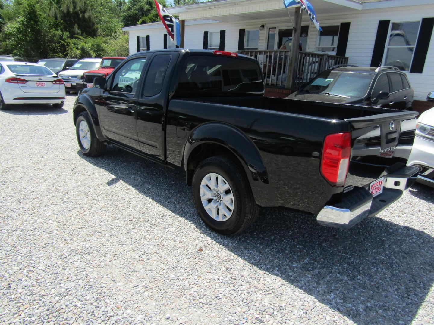 2016 Black Nissan Frontier SV King Cab I4 5MT 2WD (1N6BD0CT7GN) with an 2.5L L4 DOHC 16V engine, Automatic transmission, located at 15016 S Hwy 231, Midland City, AL, 36350, (334) 983-3001, 31.306210, -85.495277 - Photo#3