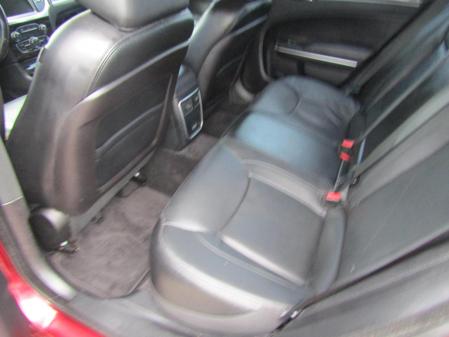 2015 Red Chrysler 300 Limited RWD (2C3CCAAG1FH) with an 3.6L V6 SOHC 24V engine, Automatic transmission, located at 15016 S Hwy 231, Midland City, AL, 36350, (334) 983-3001, 31.306210, -85.495277 - Photo#3