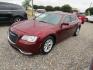 2015 Red Chrysler 300 Limited RWD (2C3CCAAG1FH) with an 3.6L V6 SOHC 24V engine, Automatic transmission, located at 15016 S Hwy 231, Midland City, AL, 36350, (334) 983-3001, 31.306210, -85.495277 - Photo#1