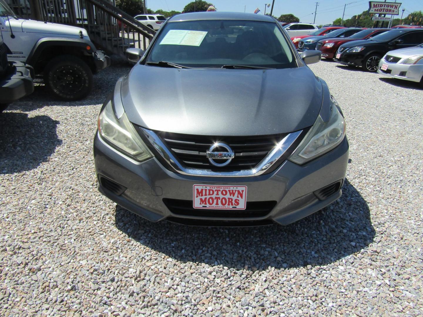 2016 Gray Nissan Altima 2.5 SL (1N4AL3AP0GC) with an 2.5L L4 DOHC 16V engine, Automatic transmission, located at 15016 S Hwy 231, Midland City, AL, 36350, (334) 983-3001, 31.306210, -85.495277 - Photo#1