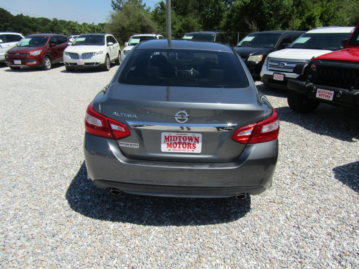2016 Gray Nissan Altima 2.5 SL (1N4AL3AP0GC) with an 2.5L L4 DOHC 16V engine, Automatic transmission, located at 15016 S Hwy 231, Midland City, AL, 36350, (334) 983-3001, 31.306210, -85.495277 - Photo#5