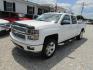 2014 White Chevrolet Silverado 1500 1LZ Crew Cab 4WD (3GCUKSEC2EG) with an 5.3L V8 OHV 16V engine, Automatic transmission, located at 15016 S Hwy 231, Midland City, AL, 36350, (334) 983-3001, 31.306210, -85.495277 - Photo#2