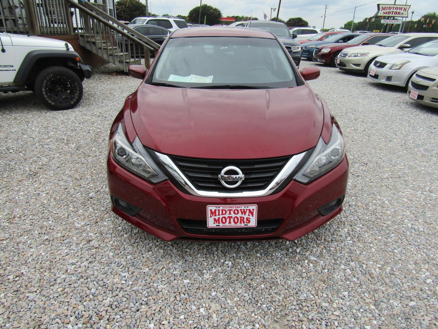 2018 Red Nissan Altima 2.5 (1N4AL3AP1JC) with an 2.5L L4 DOHC 16V engine, Automatic transmission, located at 15016 S Hwy 231, Midland City, AL, 36350, (334) 983-3001, 31.306210, -85.495277 - Photo#1