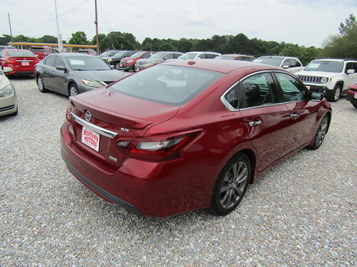 2018 Red Nissan Altima 2.5 (1N4AL3AP1JC) with an 2.5L L4 DOHC 16V engine, Automatic transmission, located at 15016 S Hwy 231, Midland City, AL, 36350, (334) 983-3001, 31.306210, -85.495277 - Photo#7