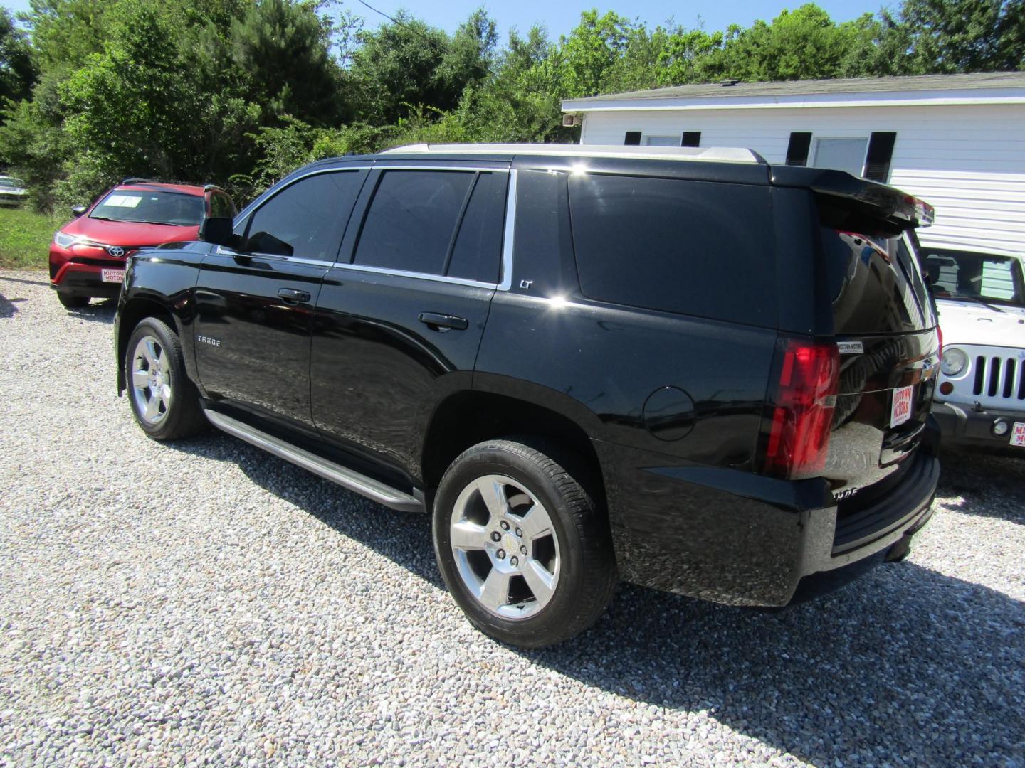 2018 Black Chevrolet Tahoe LT 2WD (1GNSCBKCXJR) with an 5.3L V8 OHV 16V engine, Automatic transmission, located at 15016 S Hwy 231, Midland City, AL, 36350, (334) 983-3001, 31.306210, -85.495277 - Photo#5