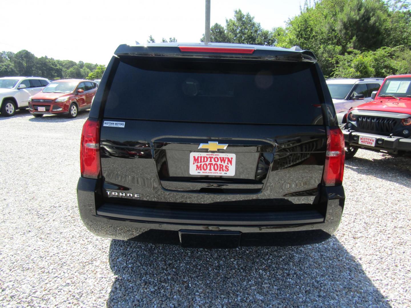 2018 Black Chevrolet Tahoe LT 2WD (1GNSCBKCXJR) with an 5.3L V8 OHV 16V engine, Automatic transmission, located at 15016 S Hwy 231, Midland City, AL, 36350, (334) 983-3001, 31.306210, -85.495277 - Photo#6