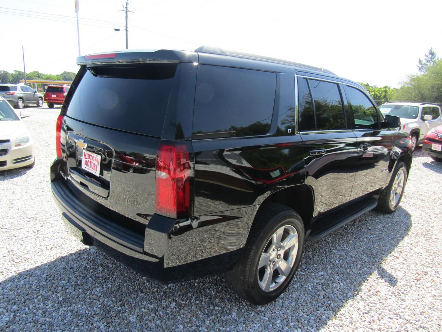 2018 Black Chevrolet Tahoe LT 2WD (1GNSCBKCXJR) with an 5.3L V8 OHV 16V engine, Automatic transmission, located at 15016 S Hwy 231, Midland City, AL, 36350, (334) 983-3001, 31.306210, -85.495277 - Photo#7