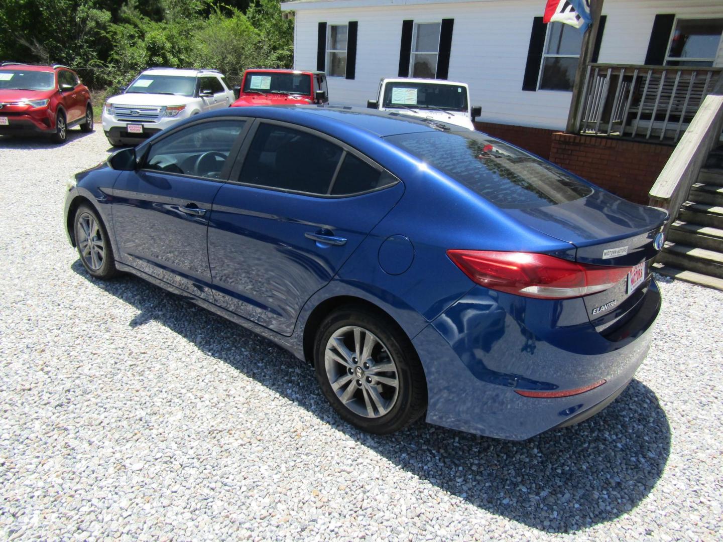 2018 Blue Hyundai Elantra Limited (5NPD84LF1JH) with an 1.8L L4 DOHC 16V engine, Automatic transmission, located at 15016 S Hwy 231, Midland City, AL, 36350, (334) 983-3001, 31.306210, -85.495277 - Photo#5