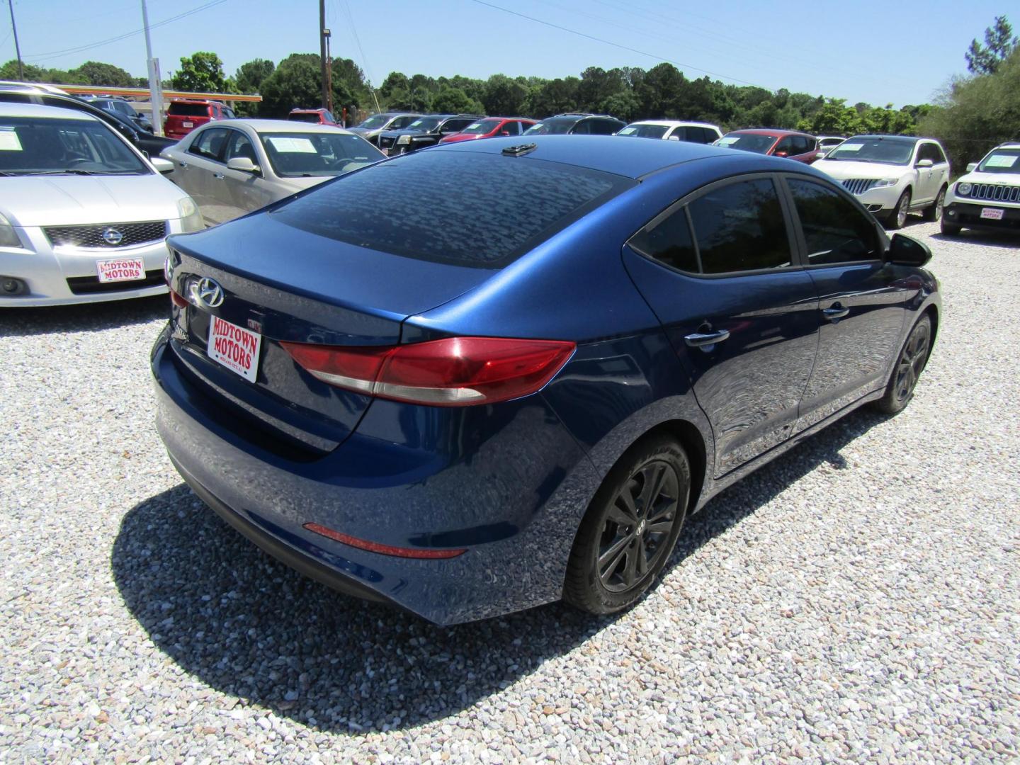2018 Blue Hyundai Elantra Limited (5NPD84LF1JH) with an 1.8L L4 DOHC 16V engine, Automatic transmission, located at 15016 S Hwy 231, Midland City, AL, 36350, (334) 983-3001, 31.306210, -85.495277 - Photo#7