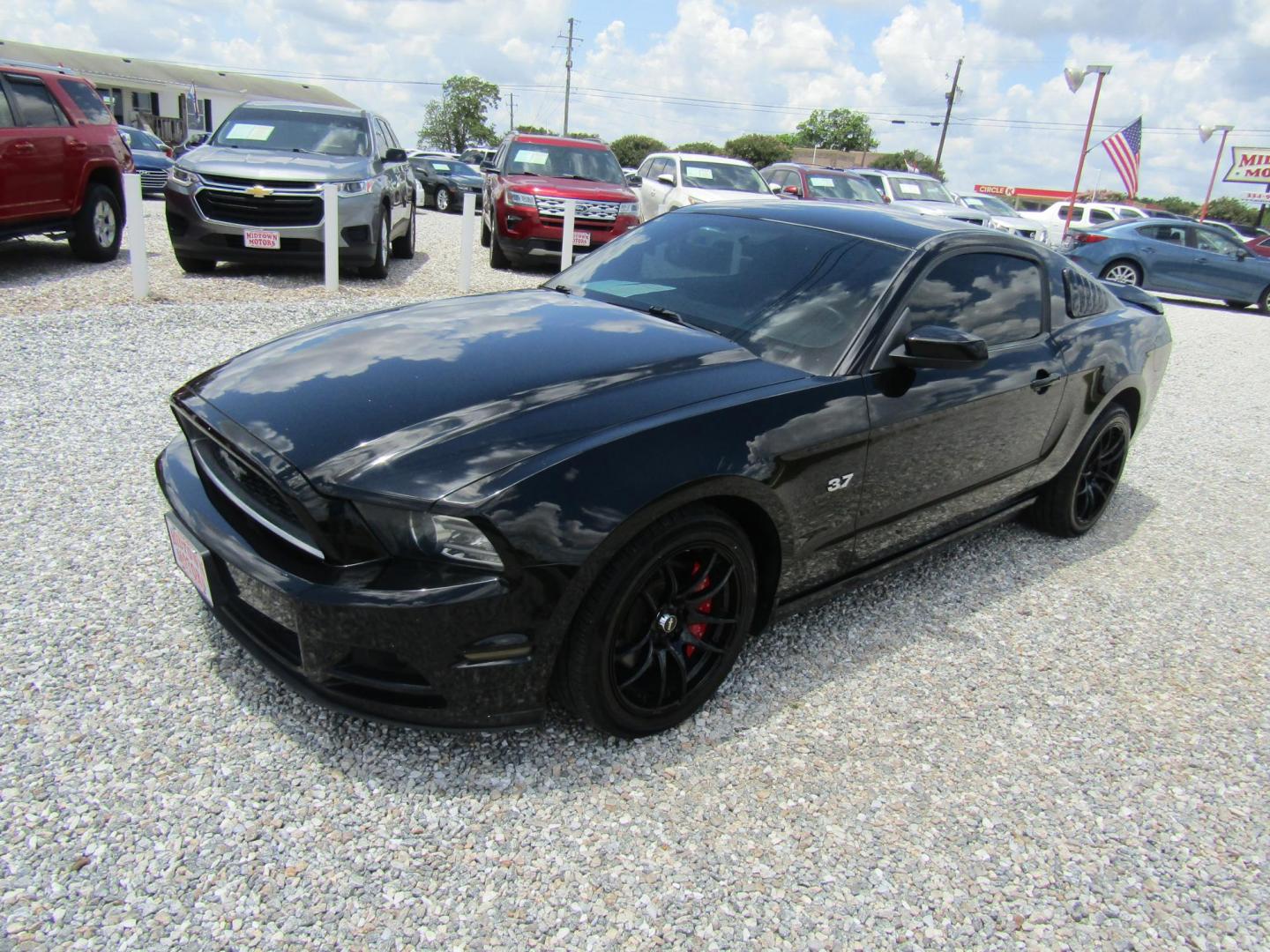 2014 Black Ford Mustang V6 Coupe (1ZVBP8AM1E5) with an 3.7L V6 DOHC 24V engine, Automatic transmission, located at 15016 S Hwy 231, Midland City, AL, 36350, (334) 983-3001, 31.306210, -85.495277 - Photo#2