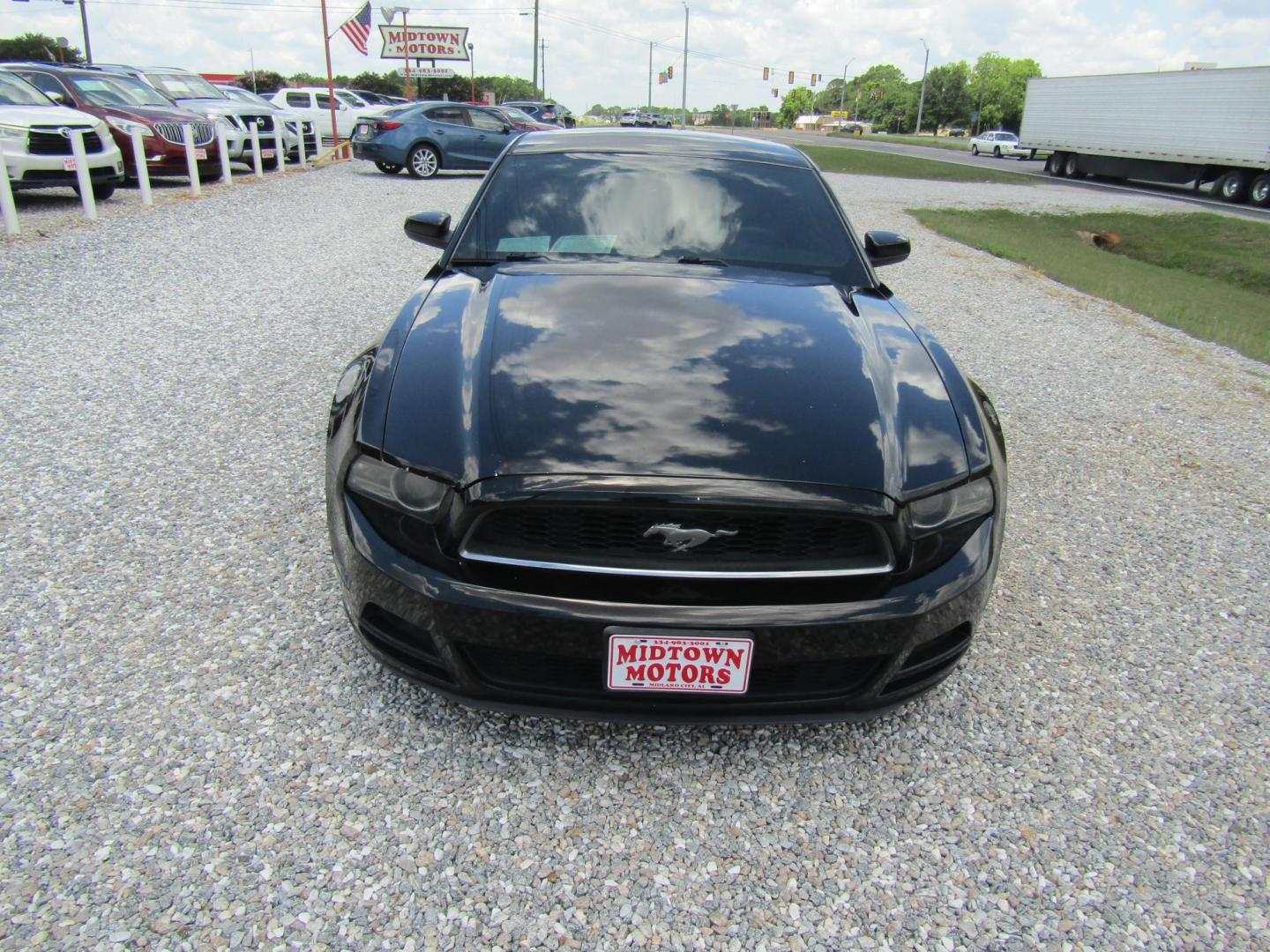 2014 Black Ford Mustang V6 Coupe (1ZVBP8AM1E5) with an 3.7L V6 DOHC 24V engine, Automatic transmission, located at 15016 S Hwy 231, Midland City, AL, 36350, (334) 983-3001, 31.306210, -85.495277 - Photo#1