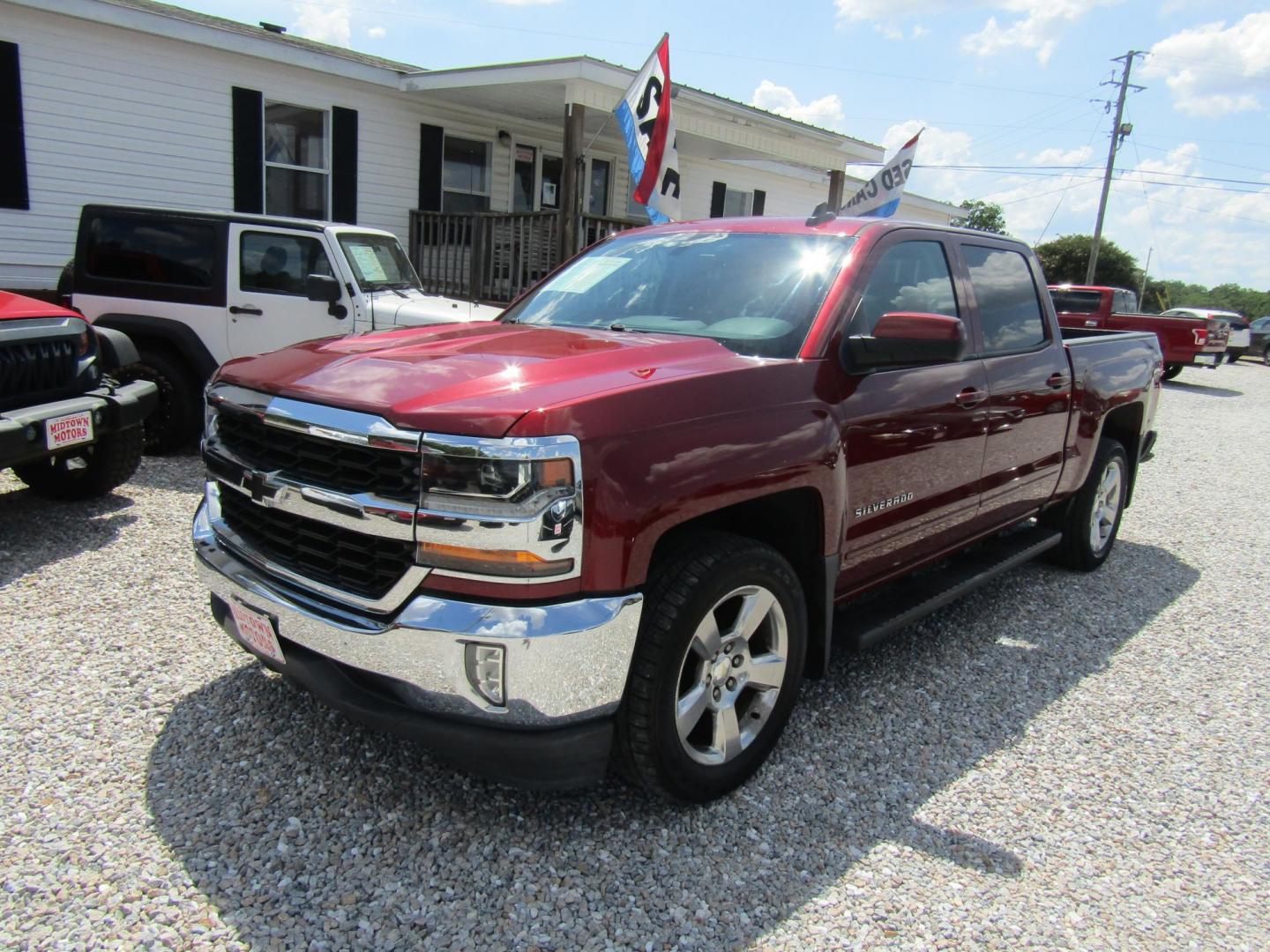 2017 Red Chevrolet Silverado 1500 LT Crew Cab 2WD (3GCPCREC0HG) with an 5.3L V8 OHV 16V engine, Automatic transmission, located at 15016 S Hwy 231, Midland City, AL, 36350, (334) 983-3001, 31.306210, -85.495277 - Photo#2