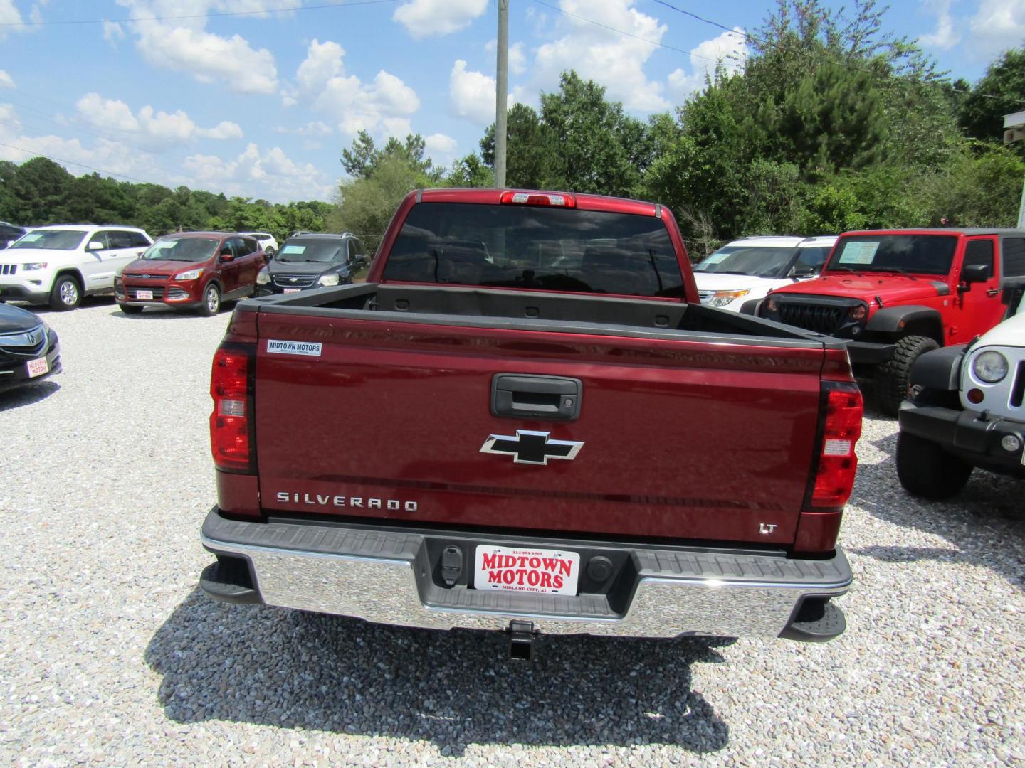 2017 Red Chevrolet Silverado 1500 LT Crew Cab 2WD (3GCPCREC0HG) with an 5.3L V8 OHV 16V engine, Automatic transmission, located at 15016 S Hwy 231, Midland City, AL, 36350, (334) 983-3001, 31.306210, -85.495277 - Photo#6